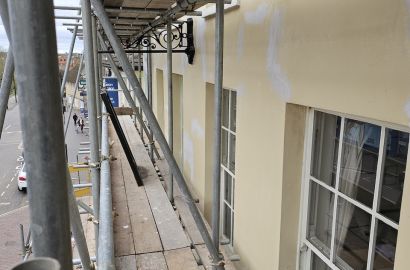 Applying Filler to Damaged Window Frame